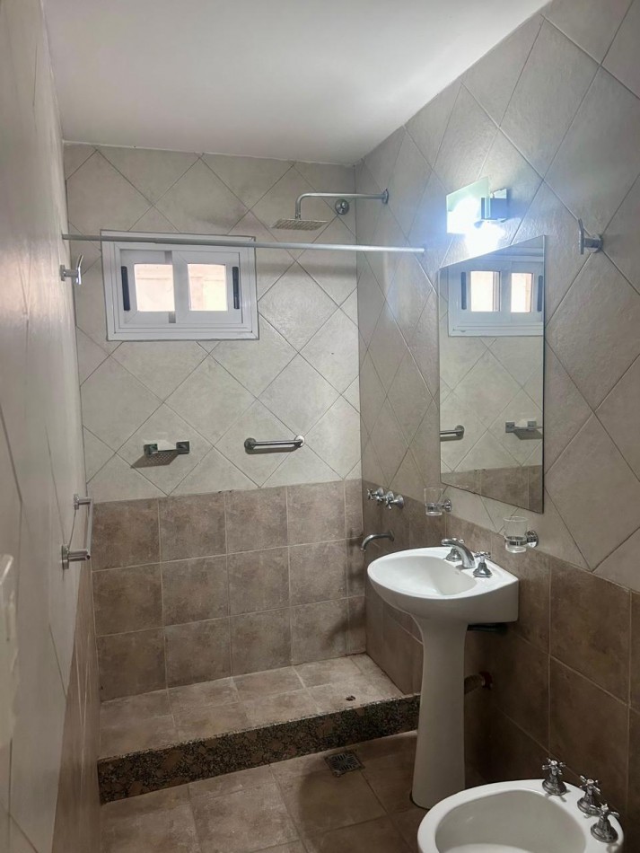 DEPARTAMENTO DOS AMBIENTES CON COCHERA 